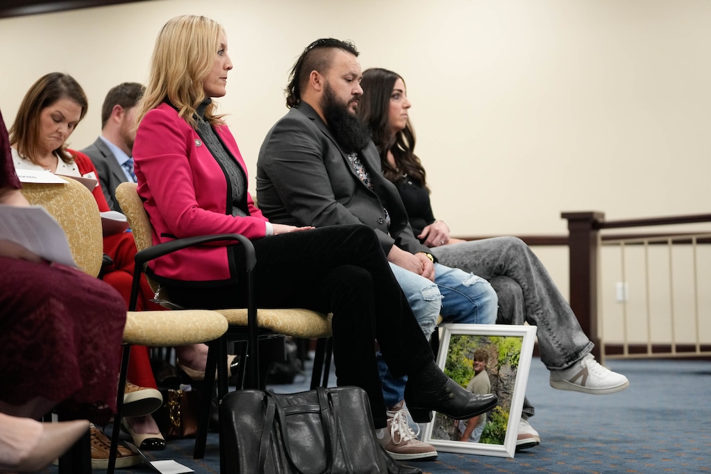(Francisco Kjolseth | The Salt Lake Tribune) Aimee Winder Newton, left, senior advisor to Gov. Spencer Cox and director of the Office of Families attends the House judiciary committee alongside grieving parents Karl and Britney Obray about HB464 Social Media Regulation Act Amendments on Wednesday, February. 14, 2024 at the Capitol. The Obray family testified that social media led their teenage son Dexton to commit suicide.