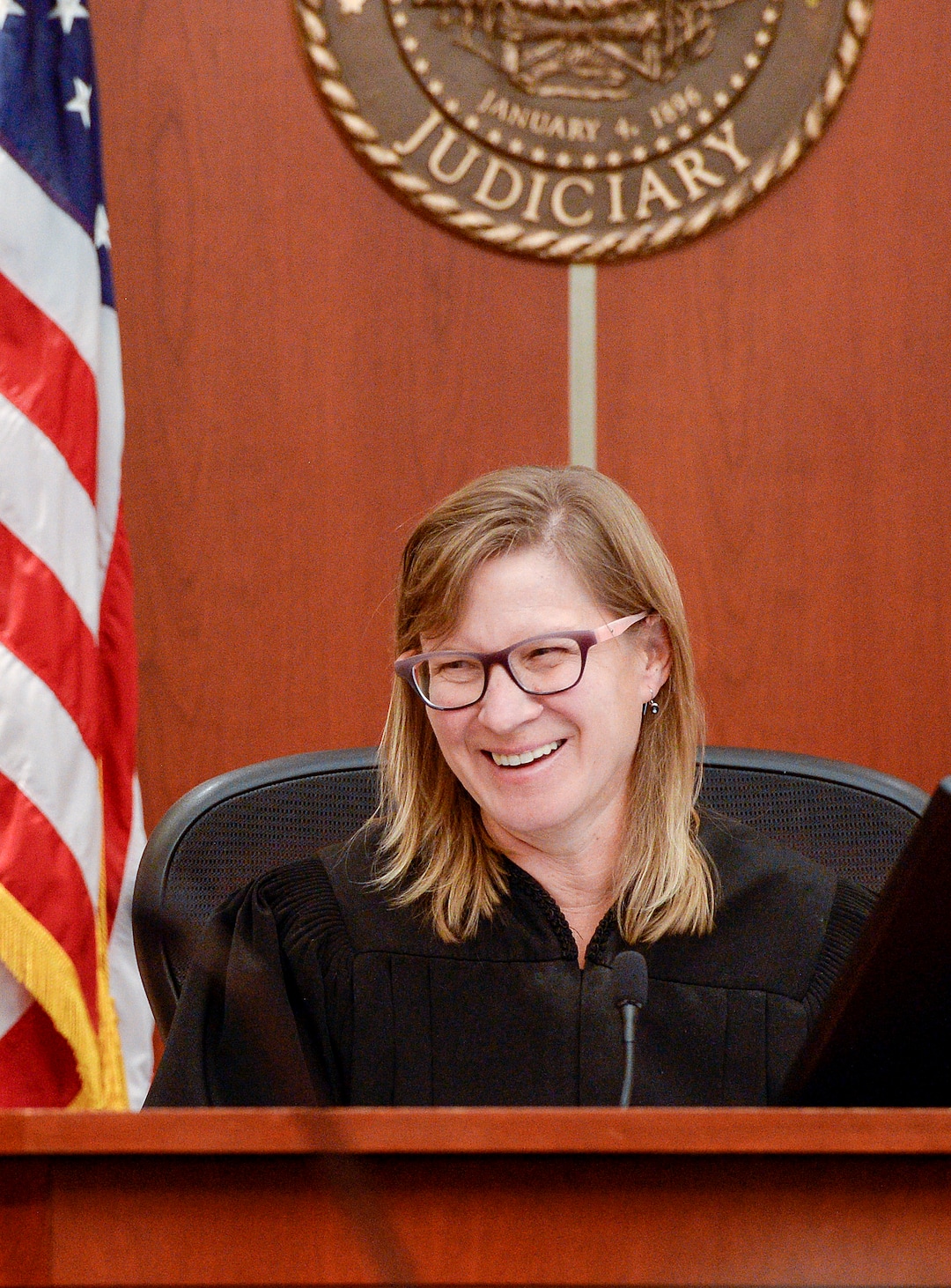 (Leah Hogsten  |  The Salt Lake Tribune)   Judge Kara Pettit shares a laugh with defense attorneys in her Third District Courtroom, Nov. 19, 2019.Defense attorneys Leah Farrell with the AmericanÊCivil Liberties UnionÊof Utah and Randy Richards argued on behalf of their plaintiff Tilli Buchanan that UtahÕs lewdness statute is unconstitutional because it discriminates against women.  Buchanan is facing charges of lewdness involving a child after police say she took off her top while cleaning out the garage and her stepchildren saw her breasts. Judge Pettit is expected to rule in two months.