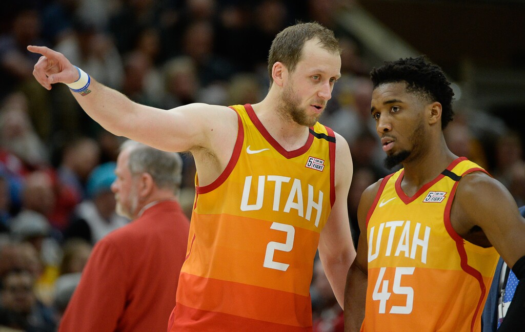(Francisco Kjolseth | The Salt Lake Tribune) Utah Jazz guard Joe Ingles (2) and Utah Jazz guard Donovan Mitchell (45) talk during the game as the Utah Jazz host the Miami Heat in their NBA basketball game at Vivint Smart Home Arena in Salt Lake City on Wednesday, Feb. 12, 2020.