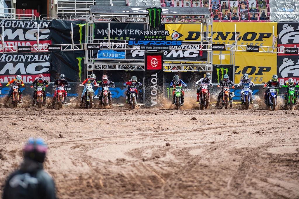 (Photo courtesy of Feld Entertainment, Inc.)
Garrett Marchbanks (No. 36) of Coalville leads riders off the line and into muddy Rice-Eccles Stadium during an AMA Supercross 250SX race on June 7, 2020. Marchbanks crashed within the first laps of the main event and was taken to the hospital. He will not finish out the series.