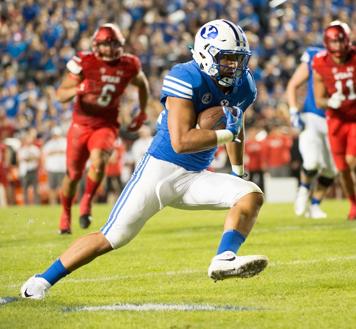 (Rick Egan  |  The Salt Lake Tribune)   Brigham Young Cougars running back Kavika Fonua (44) runs with the ball, in football action BYU vs Utah, at Lavell Edwards Stadium in Provo, Saturday, September 9, 2017.