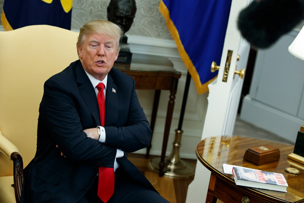 In this Feb. 2, 2018, photo, President Donald Trump speaks during a meeting with North Korean defectors where he talked with reporters about allowing the release of a secret memo on the FBI's role in the Russia inquiry, in the Oval Office of the White House in Washington. Ignoring the objections of the Justice Department and warnings from his own staff, Trump’s authorization of the release of a bitterly disputed, formerly highly classified memo was his latest contentious move to upend the investigation into his campaign’s ties to Russia or whether the president obstructed justice.(AP Photo/Evan Vucci)