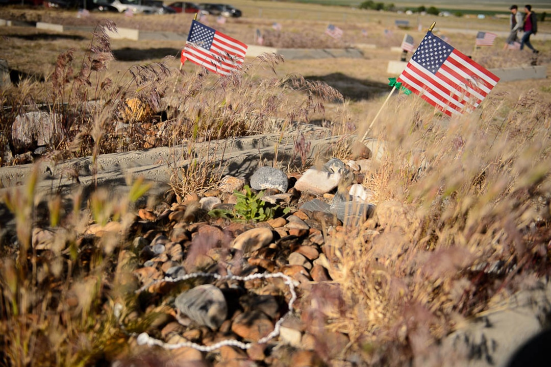 (Trent Nelson | The Salt Lake Tribune)  Descendants of the Hawaiians who settled the desert town of Iosepa took time during their Memorial Day gathering to clean the graves of their ancestors, Saturday May 26, 2018.