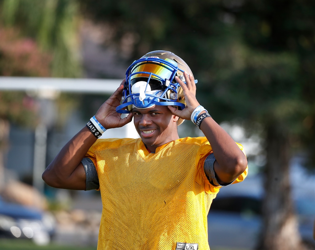 (Gary Kazanjian | Special to The Tribune) Clovis High School quarterback Nate Johnson works out with his team at Clovis High School, who committed to play for the University of Utah, shown Wednesday, July 28, 2021, in Clovis, Calif.
