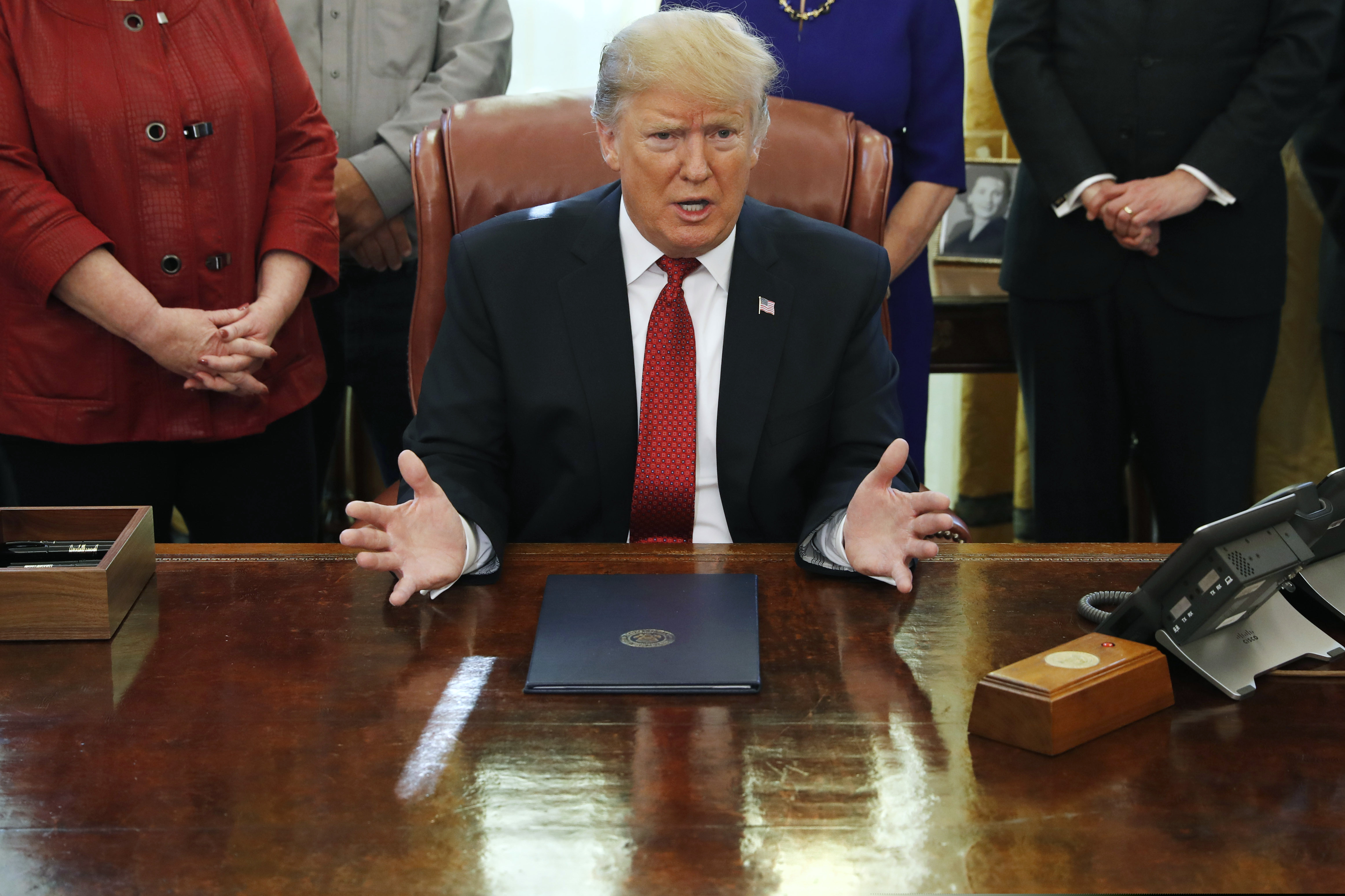 President Donald Trump speaks during a meeting with American manufacturers in the Oval Office of the White House, Thursday, Jan. 31, 2019, in Washington. (AP Photo/Jacquelyn Martin)