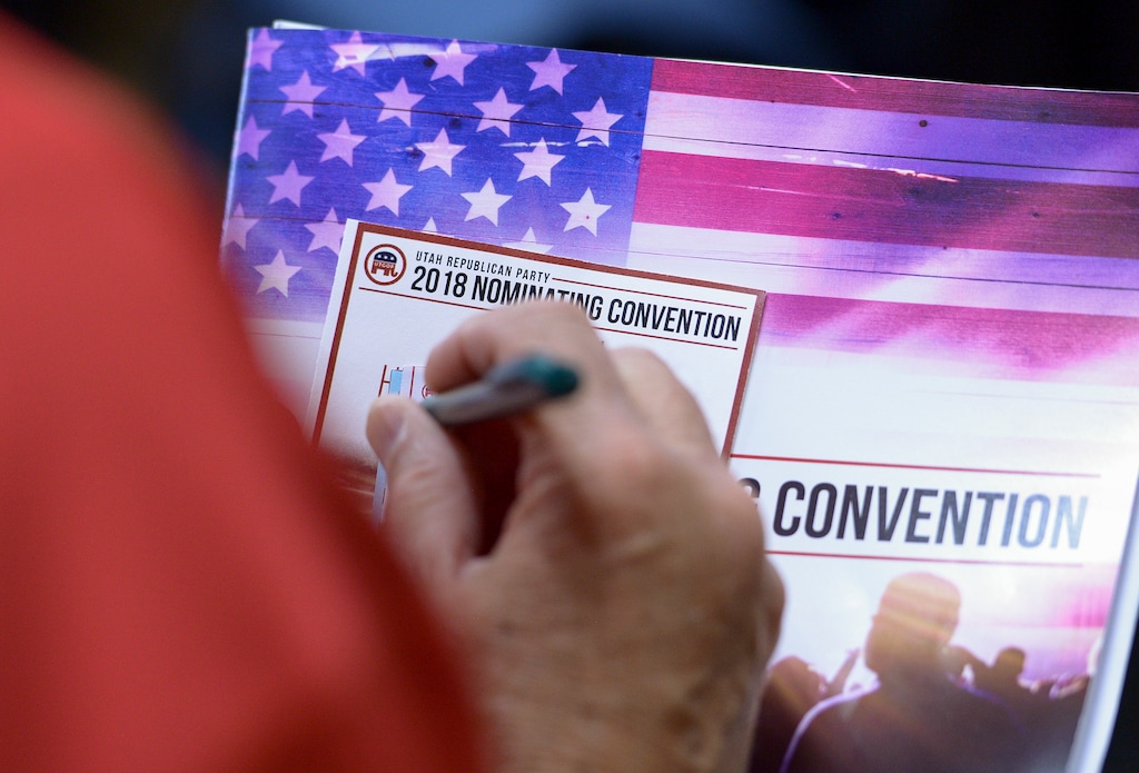 (Leah Hogsten | Tribune file photo) A state delegate casts his ballot at the Utah Republican Nominating Convention on April 21, 2018 at the Maverik Center.