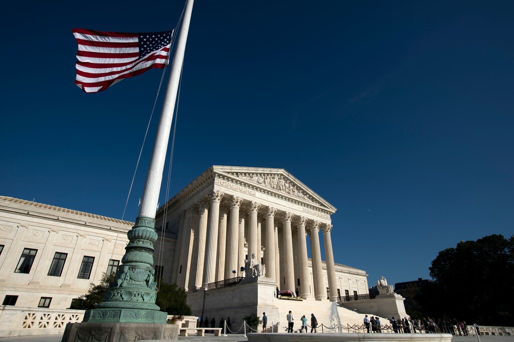 (Jose Luis Magana | AP file photo)  Mourners pay their respects as Justice Ruth Bader Ginsburg lies in repose under the Portico at the top of the front steps of the U.S. Supreme Court building on Wednesday, Sept. 23, 2020, in Washington. Ginsburg, 87, died of cancer on Sept. 18.
