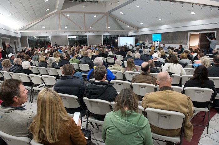 (Rick Egan  |  The Salt Lake Tribune)  Hundreds of concerned citizens gather at the St Vincent De Paul Catholic School for a public hearing about the developers plans for the old Cottonwood Mall site. Wednesday, December 13, 2017.


