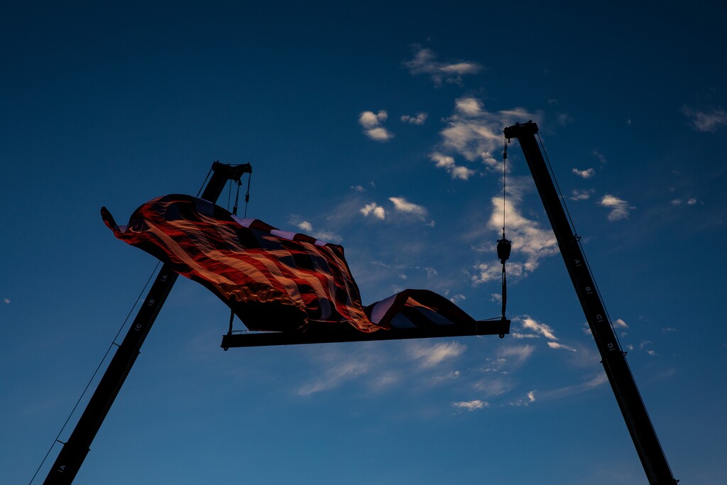 (Damon Winter | The New York Times)

An American flag is flown at a rally at the Valdosta Regional Airport in Valdosta, Ga., Dec. 5, 2020.
