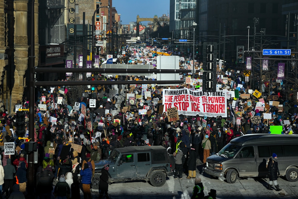 (Vincent Alban | The New York Times) Demonstrators march to protest the Trump administration's immigration crackdown in Minneapolis on Friday, Jan. 23, 2026. A temperature of around minus 10 degrees on Friday did little to slow protests around the Twin Cities, with businesses closing, workers and students staying home, and demonstrators demanding that federal immigration agents depart.
