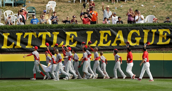 Japan celebrates after winning the Little League World Series Championship baseball game against Lufkin, Texas, Sunday, Aug. 27, 2017, in South Williamsport, Pa. (AP Photo/Matt Slocum)