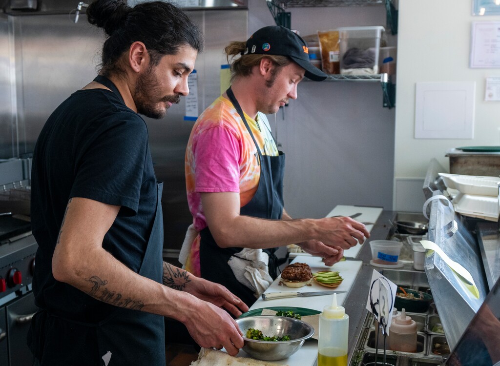 (Rick Egan | The Salt Lake Tribune) Sous chef Jaime Ordaz, and Devon Auchterlonie, executive chef, prepare food at Yoko Taco in Salt Lake City's Granary District, on Thursday, April 28, 2022.