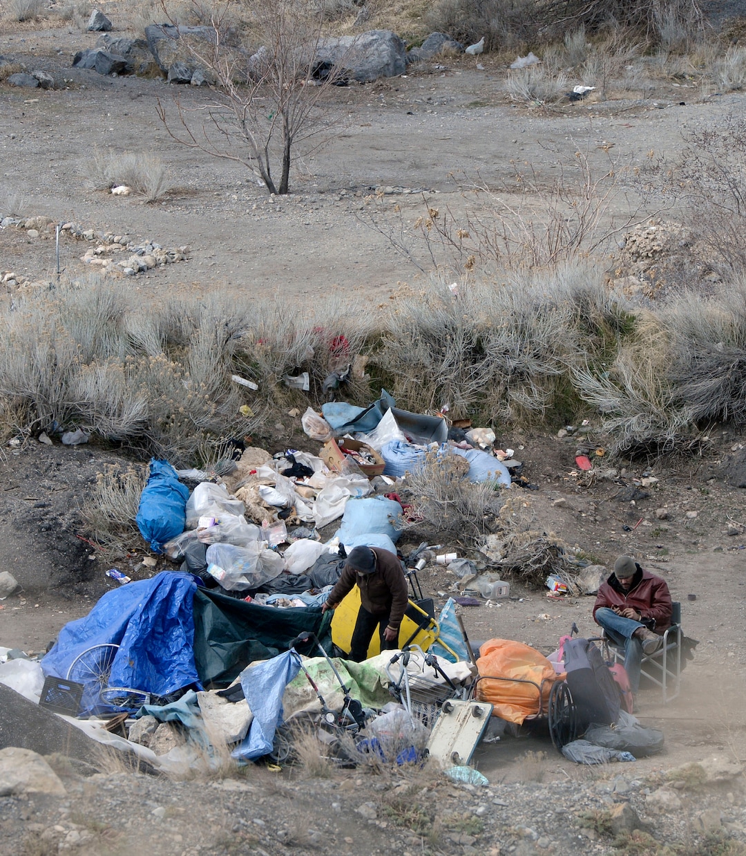 (Al Hartmann  |  The Salt Lake Tribune) 	
One of several homeless camps perched on the mountainside above Victory Road north of state Capitol building. Disposal of garbage is an ongoing problem in the area.