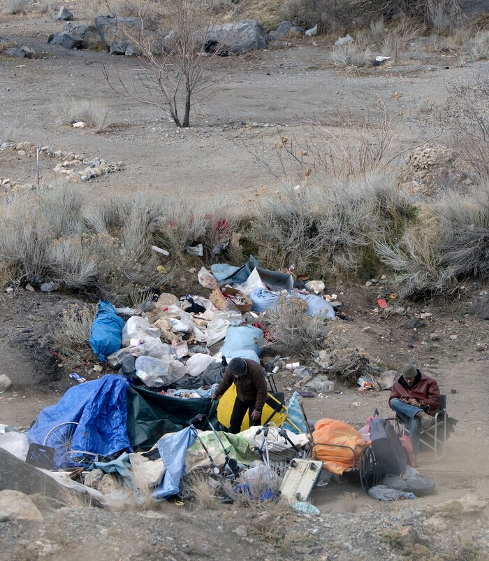 (Al Hartmann  |  The Salt Lake Tribune) 	
One of several homeless camps perched on the mountainside above Victory Road north of state Capitol building. Disposal of garbage is an ongoing problem in the area.