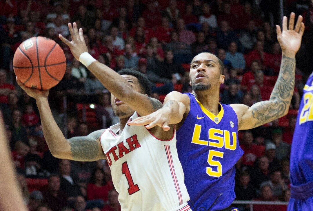 (Rick Egan  |  The Salt Lake Tribune)    LSU Utah Utes guard Justin Bibbins (1) tries to take a shot, LSU Tigers guard Daryl Edwards (5) defends, in NIT playoff action between Utah Utes and LSU Tigers at the Jon M. Huntsman Center, Monday, March 19, 2018.