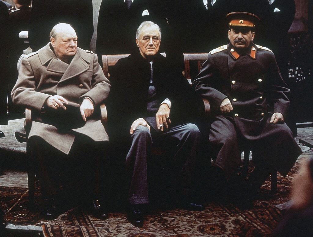 This is an AP photo from Feb. 4, 1945, of from left, British Prime Minister Winston Churchill, U.S. President Franklin Roosevelt and Soviet Premier Josef Stalin as they sit on the patio of Livadia Palace, Yalta, Crimea.