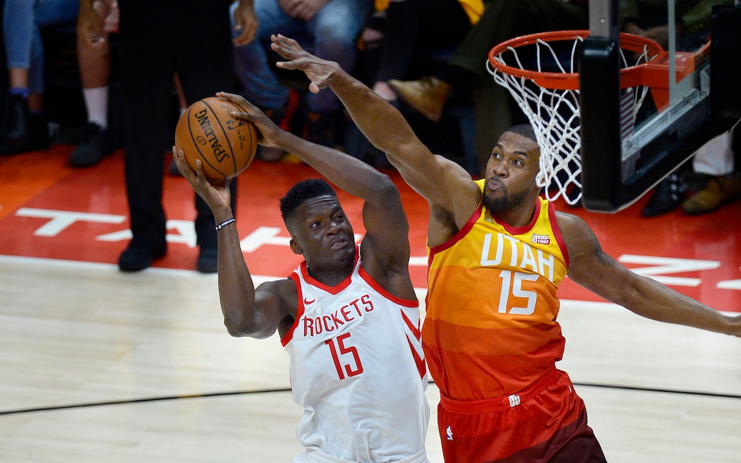 (Scott Sommerdorf | The Salt Lake Tribune)Utah Jazz forward Derrick Favors (15) tries to block the shot of Houston Rockets center Clint Capela (15) during first half play. The Houston Rockets led the Utah Jazz 70-40 at the half of game 3, Friday, May 4, 2018.
