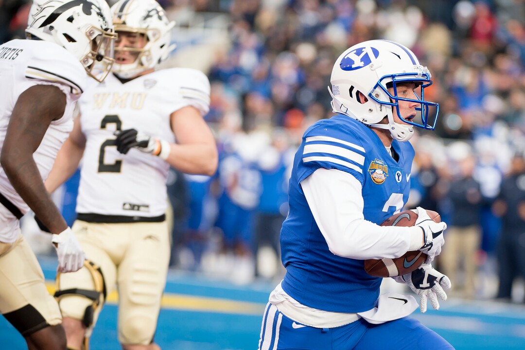 (Jeremy Harmon  |  The Salt Lake Tribune) Brigham Young Cougars wide receiver Dylan Collie (3) scores the first touchdown of the game as BYU faces the Western Michigan Broncos in the Famous Idaho Potato Bowl in Boise, Idaho, on Friday, Dec. 21, 2018.