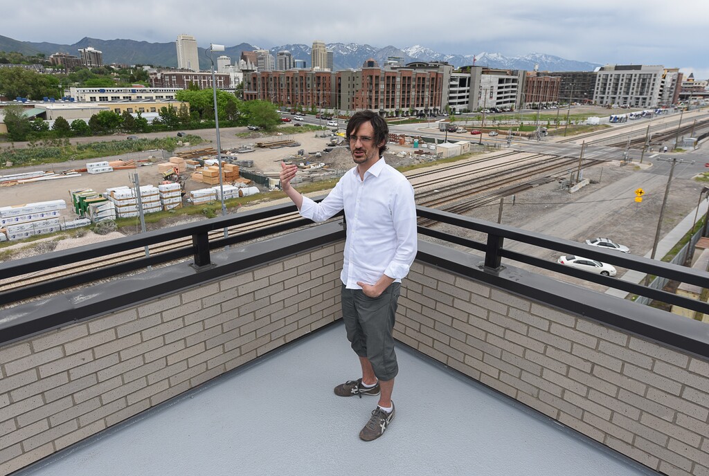 (Francisco Kjolseth | The Salt Lake Tribune) Chris Parker, who has been involved with Project Open, an affordable housing project northwest of downtown Salt Lake City, talks about "democratizing" the two best views from the building as a way to encourage tenants to meet and make friends with their neighbors on Thursday, May 10, 2018. Parker spent a year living on minimum wage, and then on the streets and in a van, to get a better idea of how to help those with more limited resources.