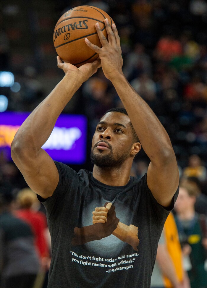 (Rick Egan  |  The Salt Lake Tribune)  Utah Utah Jazz forward Derrick Favors (15) along with players from both teams, warms up wearing a Solidarity t-shirt,  before NBA action between Utah Jazz and Brooklyn Nets at Vivint Smart Home Arena, Saturday, March 17, 2019.


