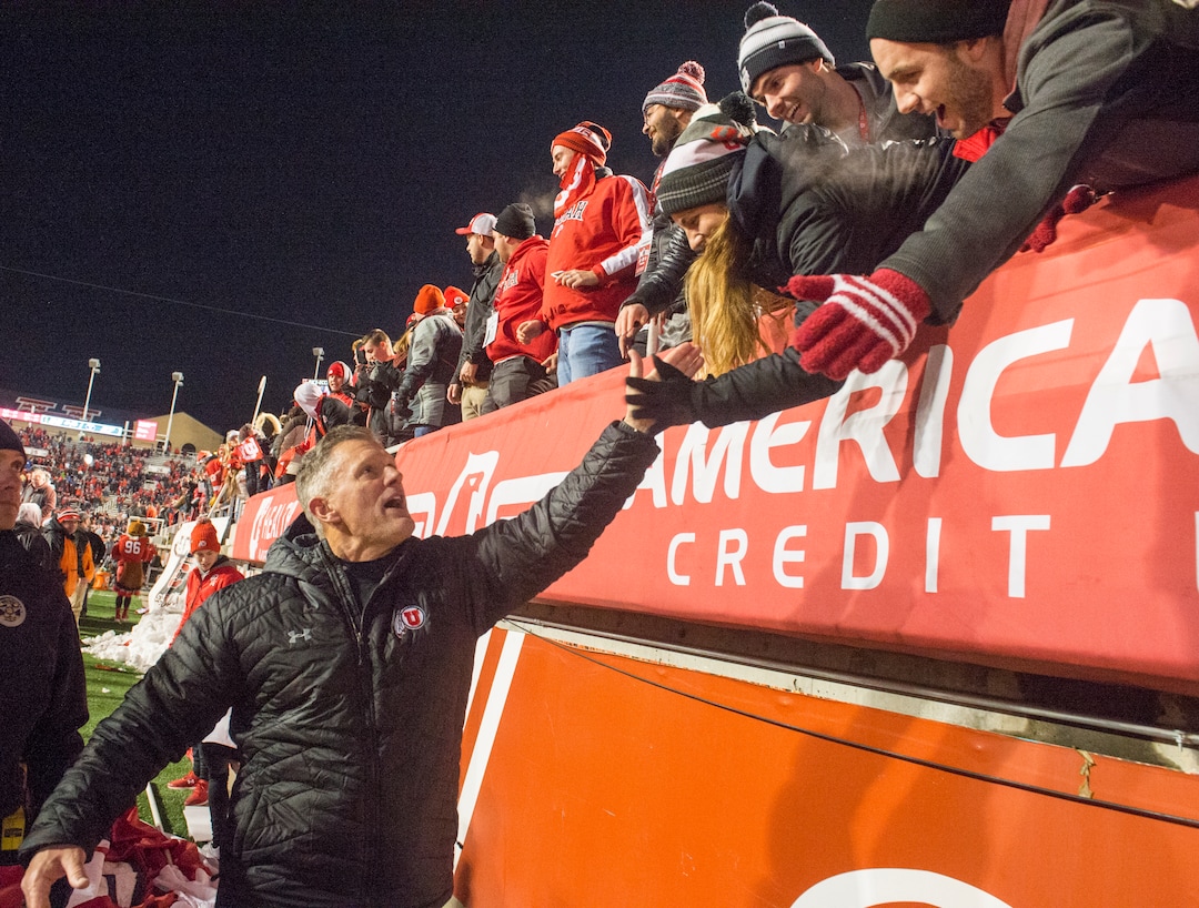 (Rick Egan  |  The Salt Lake Tribune)        Utah Utes head coach Kyle Whittingham shakes hands with fans after Utah defeated BYU for the 8th straight time, in football action between the Brigham Young Cougars and the Utah Utes, at Rice-Eccles Stadium, Saturday, November 24, 2018.