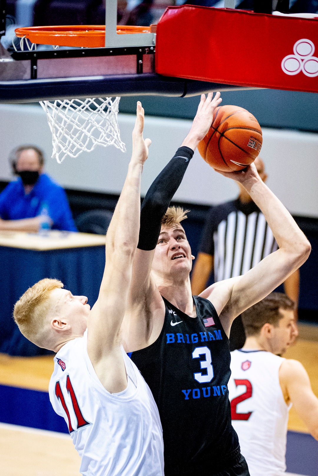 (Isaac Hale | Special to The Tribune) Brigham Young University forward Matt Haarms (3) goes up for a shot while contested by St. Mary's College forward Matthias Tass (11) during a game between the BYU Cougars and the Saint Mary’s College of California Gaels held at the Marriott Center in Provo on Saturday, Feb. 27, 2021.