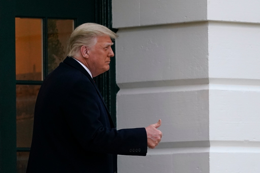 (Patrick Semansky | AP file photo)  President Donald Trump gestures to supporters as he walks onto the South Lawn of the White House in Washington, Saturday, Dec. 5, 2020.