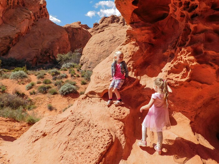 Erin Alberty  |  The Salt Lake TribuneYoung hikers play under Babylon Arch on April 1, 2017 in the Red Cliffs Desert Reserve near Leeds.