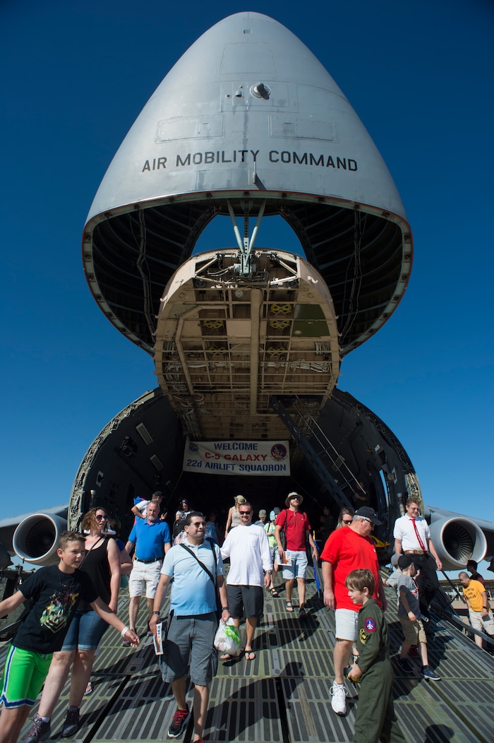 (Rick Egan  |  The Salt Lake Tribune)   Crowds of people walk through the C-5 Galaxy, on their way to the Warriors Over the Wasatch airshow at Hill Airforce Base, Sunday, June 24, 2018.