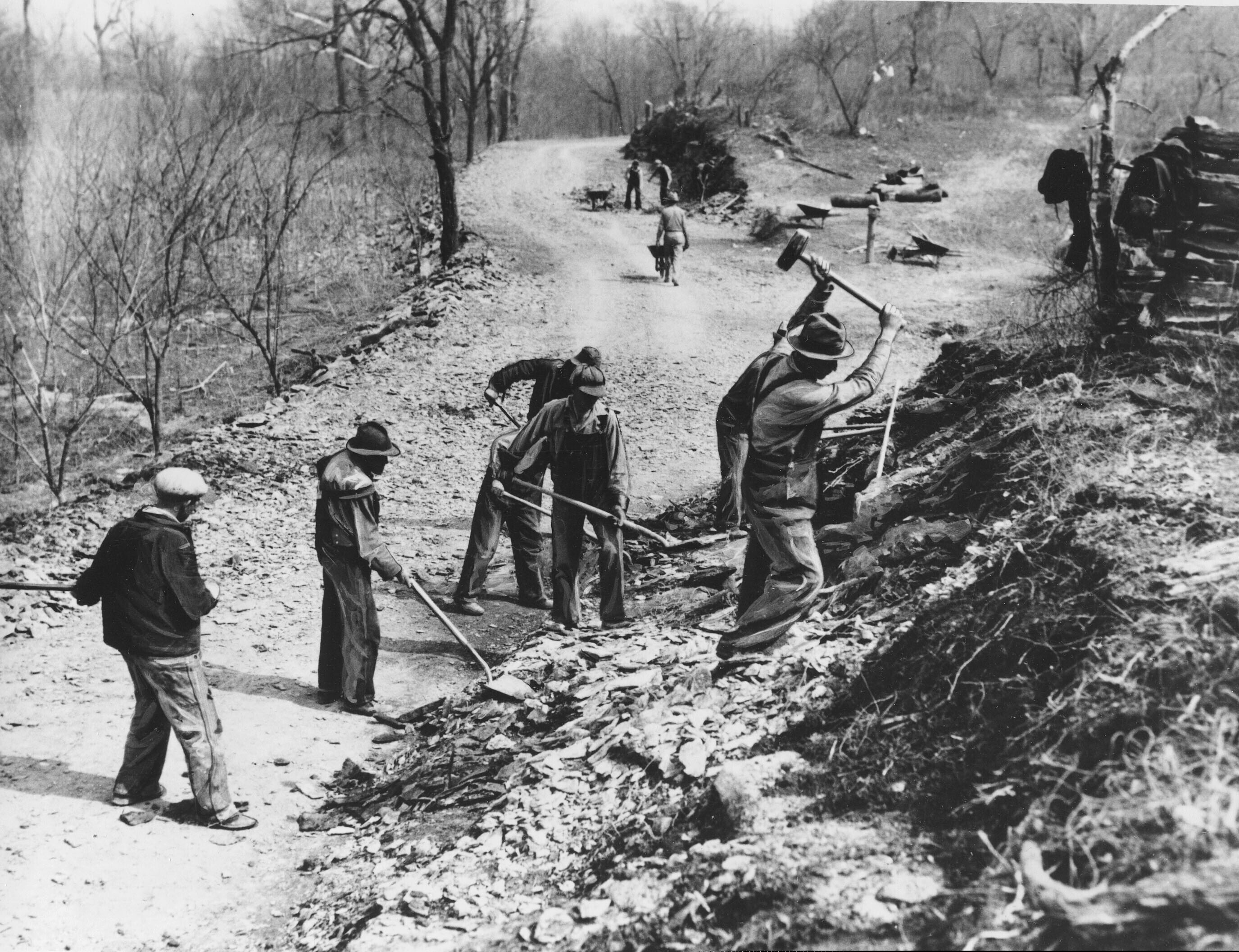 (AP file photo)
In this March 9, 1936, photo, Works Progress Administration (WPA) workers build a new farm-to-market road along Knob Creek in Tennessee. The New Deal was a try-anything moment during the Great Depression that remade the role of the federal government in American life.