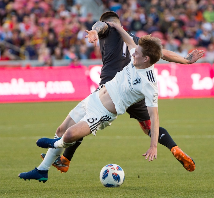 (Rick Egan  |  The Salt Lake Tribune)    Real Salt Lake midfielder Albert Rusnak (11) gets tangled up with Colorado Rapids midfielder Johan Blomberg (8), in MLS soccer action, RSL vs Colorado Rapids at Rio Tinto Stadium, Saturday, April 21, 2018.


