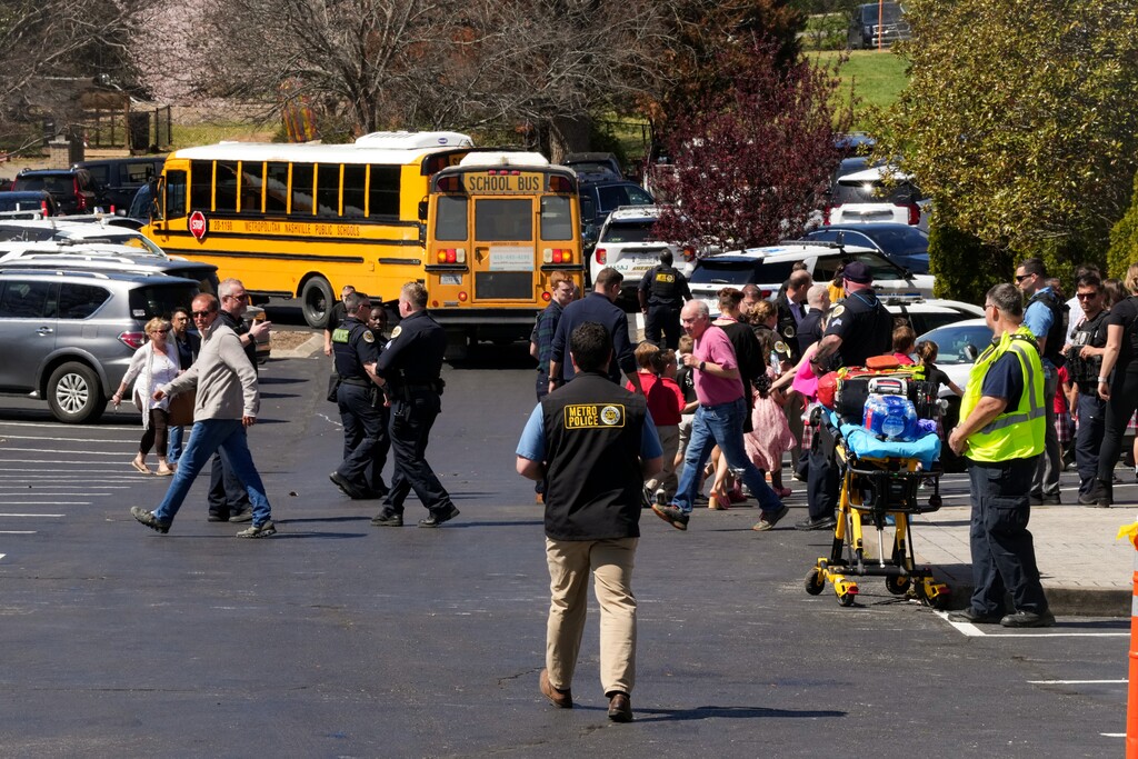 (Desiree Rios | The New York Times)

The scene outside a nearby church that had been set up as a reunification area for parents to meet their children following a shooting at a private Christian school in Nashville on Monday, March 27, 2023.