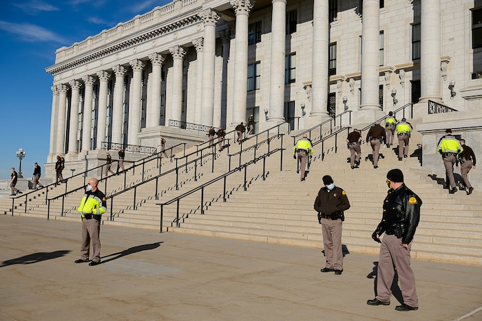 (Trent Nelson | The Salt Lake Tribune) Highway Patrol troopers at the state Capitol in Salt Lake City on Sunday, Jan. 17, 2021.