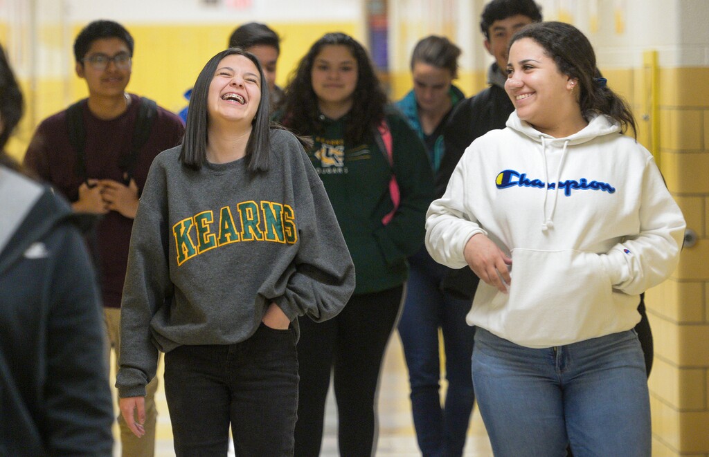 (Leah Hogsten | The Salt Lake Tribune) Kearns High School students Evelin Tapia, left, and Maria Chacin, right, share a laugh after a tutoring session at Kearns Junior High School, Wednesday, March 11, 2020. Kearns High School is empowering Latino youth to become leaders by serving the community and developing leadership skills through Latinos in Action, a class that teaches mentorship skills.