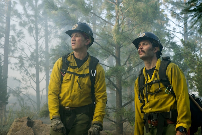 This image released by Sony Pictures shows Miles Teller, left, and Taylor Kitsch in a scene from "Only the Brave." (Richard Foreman Jr./Sony Pictures via AP)