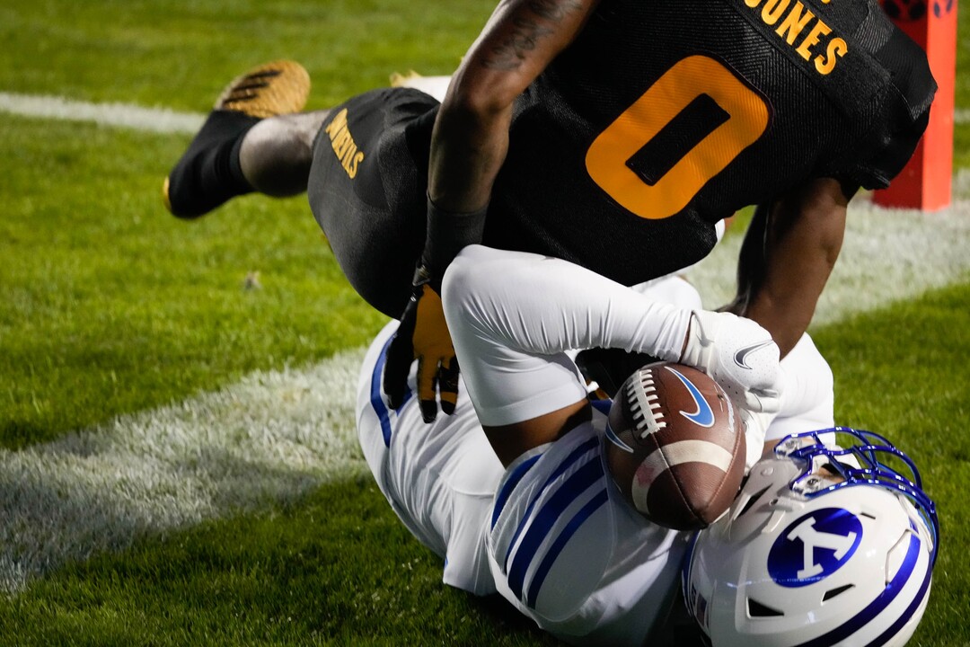 (Francisco Kjolseth | The Salt Lake Tribune) Brigham Young Cougars wide receiver Puka Nacua (12) comes close to receiving the ball for a touchdown but is pressured by Arizona State Sun Devils defensive back Jack Jones (0) at the line in football action between the Brigham Young Cougars and the Arizona State Sun Devils at LaVell Edwards Stadium in Provo, on Saturday, Sept. 18, 2021.
