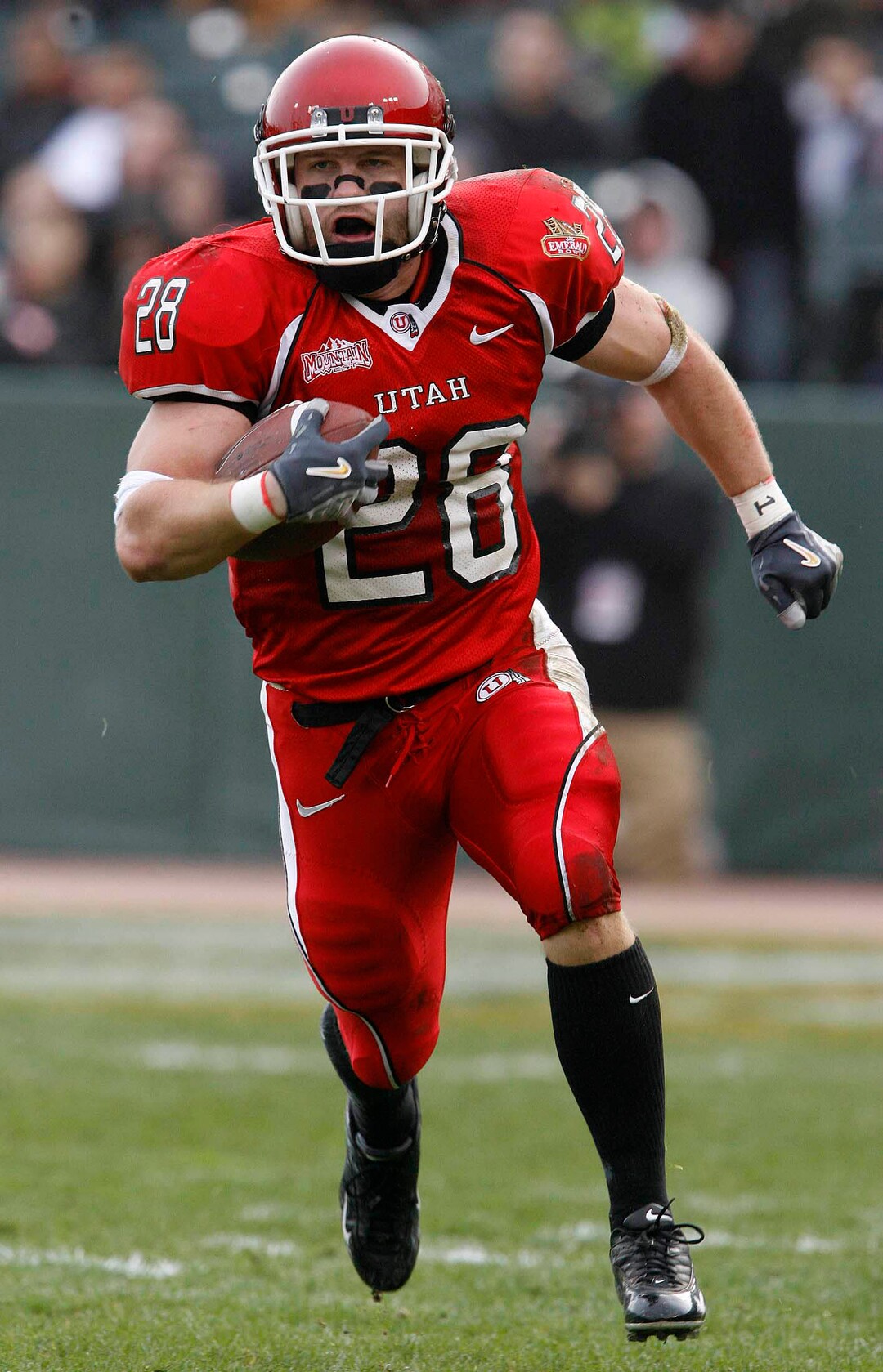 (Trent Nelson  |  Tribune File Photo)  Utah's Steve Tate runs back an interception for long yardage, in the first half against Georgia Tech during the Emerald Bowl in San Francisco December 29, 2005.