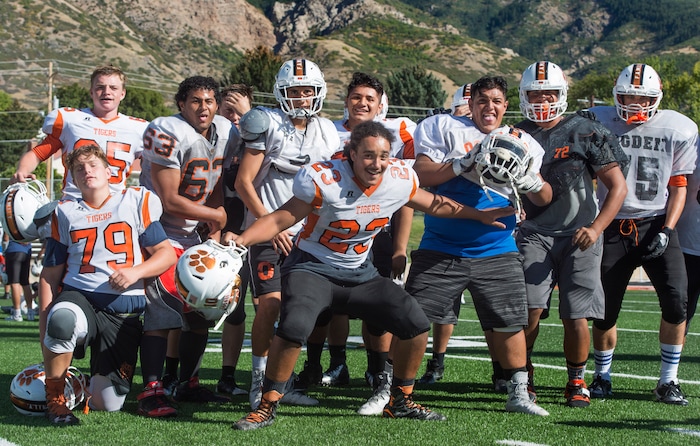 (Rick Egan  |  The Salt Lake Tribune)  Ogden football players pose for a photo during practice. The mood at practice has changed after the team broke its 36-game losing streak last week. Wednesday, September 13, 2017.