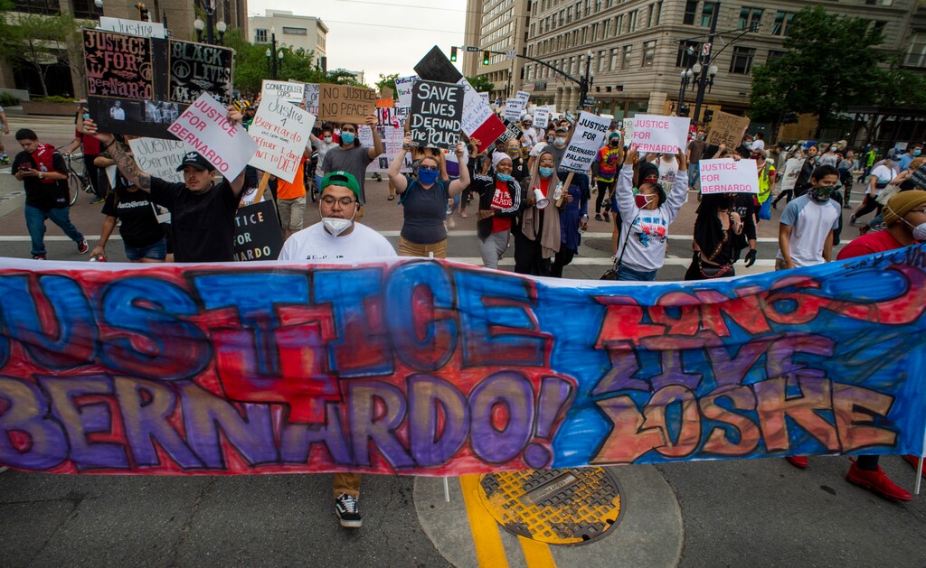 (Rick Egan  |  Tribune file photo) Protesters march down 300 South in Salt Lake City on Saturday, June 13, 2020.