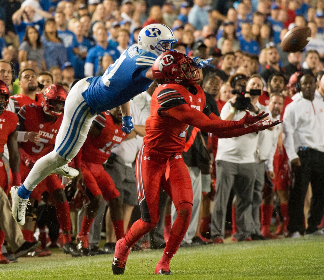 (Rick Egan  |  The Salt Lake Tribune)  Utah Utes defensive back Jaylon Johnson (7) intercepts a pass intended for Brigham Young Cougars wide receiver Talon Shumway (21), in football action BYU vs Utah, at Lavell Edwards Stadium in Provo, Saturday, September 9, 2017.