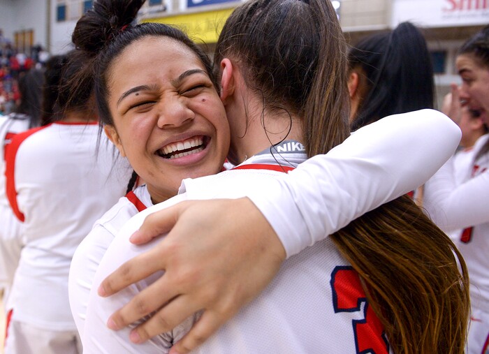 (Leah Hogsten  |  The Salt Lake Tribune) East celebrates the win.  East defeated Timpview 68-48 to win the the 5A High School Girls' Basketball Tournament title at SLCC in Taylorsville, Saturday, Feb. 24, 2018. 