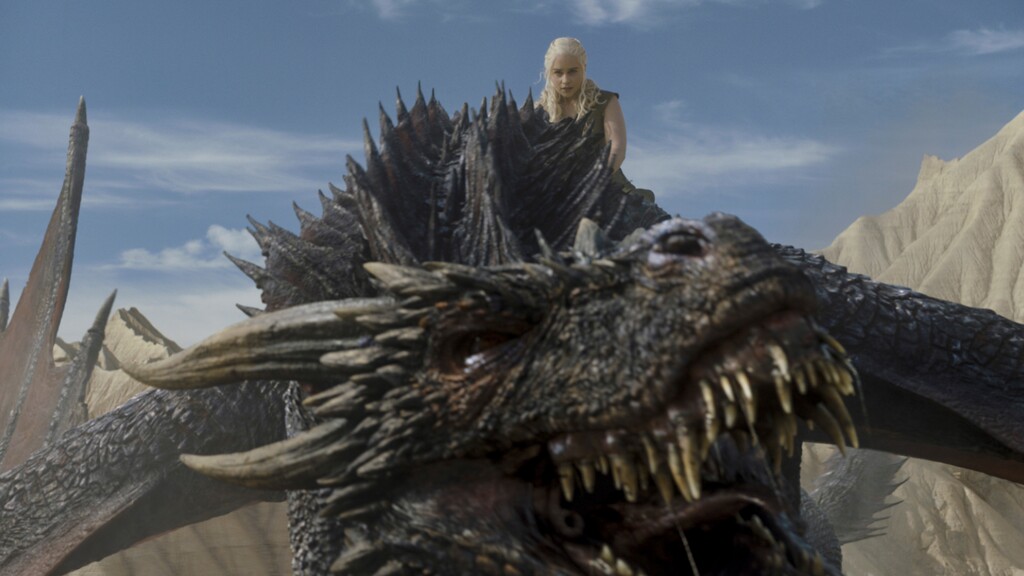 ( Photo courtesy of HBO ) Daenerys Targaryen (Emilia Clarke) rides one of her dragons in “Game of Thrones.”