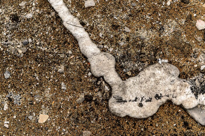 (Trent Nelson | The Salt Lake Tribune)  Molten metal at the scene of a tanker fire at 7200 South I-15, Friday January 19, 2018.
