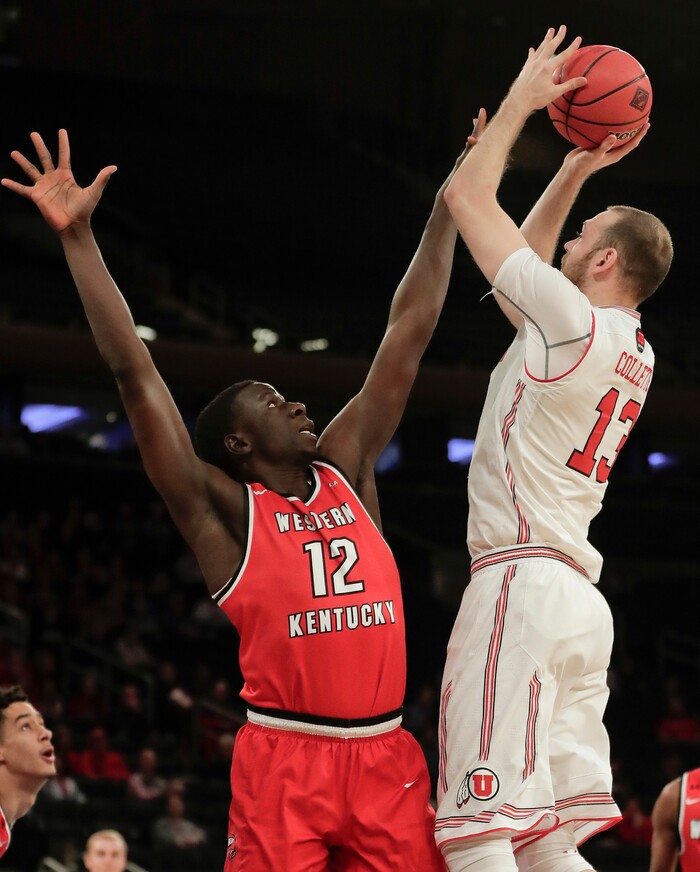Utah forward David Collette (13) shoots over Western Kentucky forward Moustapha Diagne (12) during the first half of an NCAA college basketball game in the semifinals of the NIT, Tuesday, March 27, 2018, in New York. (AP Photo/Julie Jacobson)