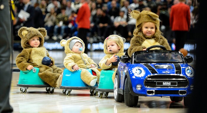 (Steve Griffin  |  The Salt Lake Tribune) Children dressed up as bears ride around the court in a car being driven remotely by the Jazz Bear during a time out in the Utah Jazz versus Denver Nuggets NBA basketball game at Vivint Smart Home Arena  in Salt Lake City Tuesday November 28, 2017.