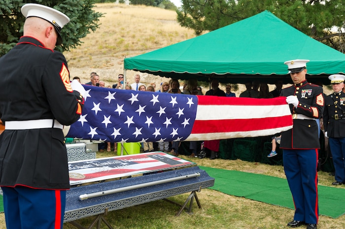 (Alex Gallivan  |  Special to The Tribune) Marine Pfc. Robert K. Holmes, who died 77 years ago aboard the USS Oklahoma during the attack on Pearl Harbor, is laid to rest in the Salt Lake City Cemetery, Monday, Aug. 20, 2018.