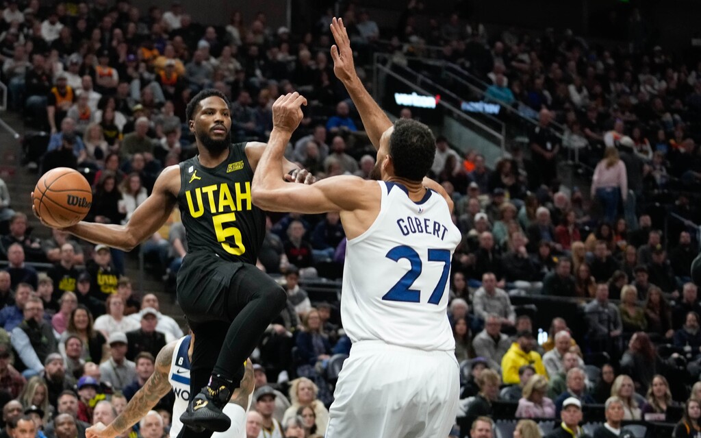 (Francisco Kjolseth | The Salt Lake Tribune) Utah Jazz guard Malik Beasley (5) looks for an open teammates while Minnesota Timberwolves center Rudy Gobert (27) as the Utah Jazz take on Minnesota Timberwolves in NBA basketball at Vivint Arena in Salt Lake City on Friday, Dec. 9, 2022.