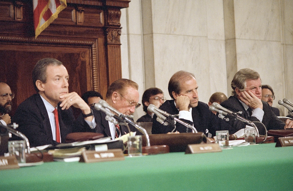 (John Duricka  |  AP Photo)  Senate Judiciary Committee Chairman Joseph Biden, D-Del., left, and Sen. Edward Kennedy, D-Mass., right, listen during witness confirmation hearings for Supreme Court nominee Robert H. Bork, Sept. 21, 1987 in Washington. Far left is Orrin Hatch, R-Utah, and Strom Thurmond, R-S.C.