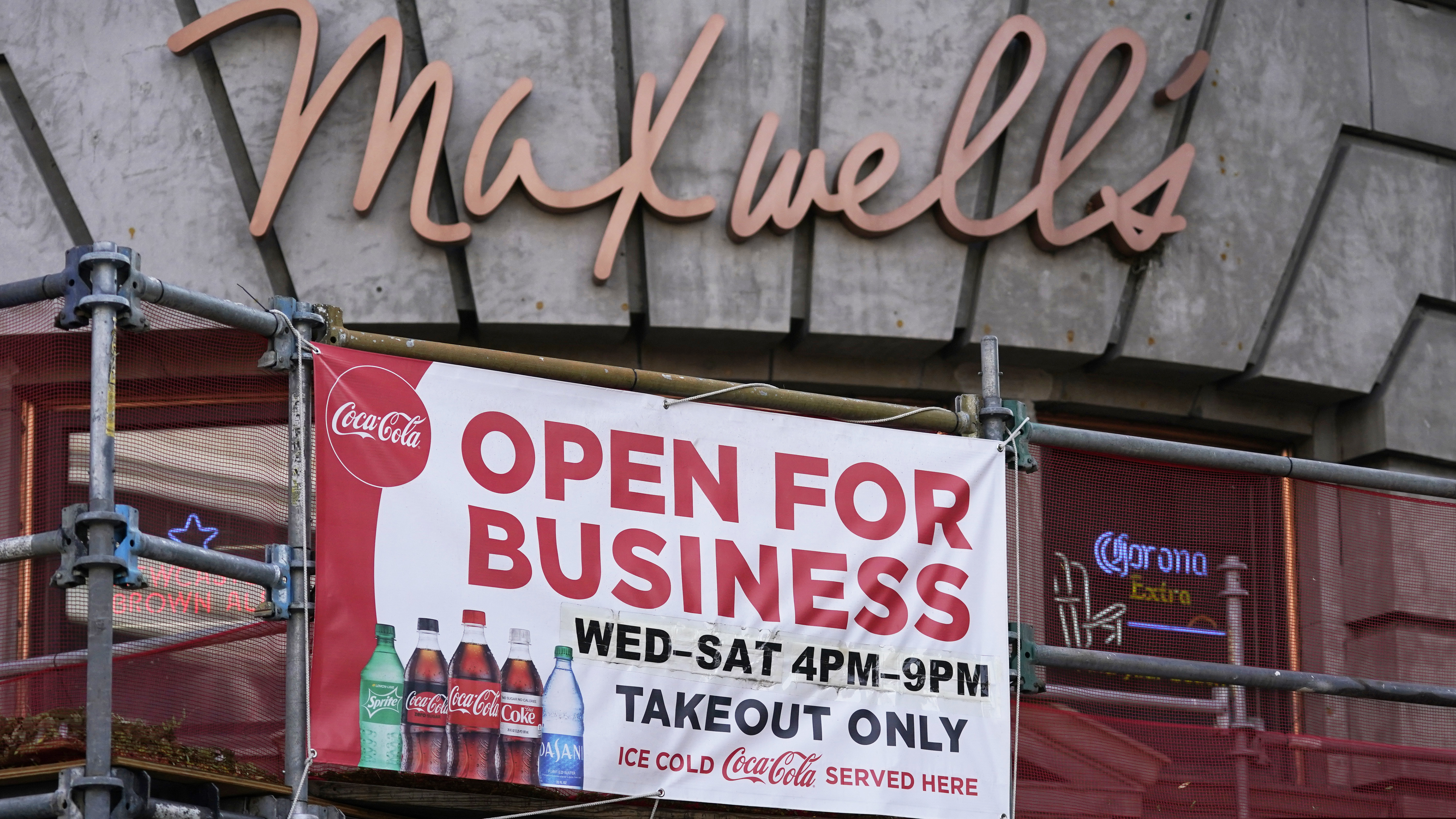 (AP file photo) An "Open For Business" sign on front Maxwell's East Coast Eatery in Salt Lake City, as seen in September. Utah’s unemployment rate fell back to 4.1% in October, according to the Labor Department, compared to 6.9% for the U.S. as a whole.