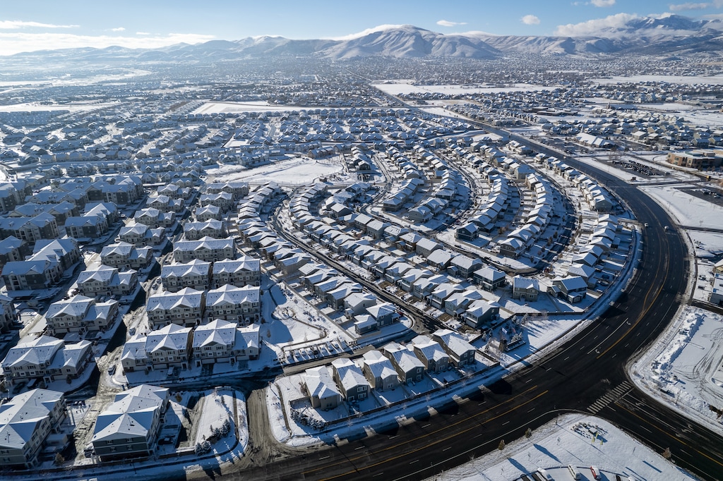 (Trent Nelson | The Salt Lake Tribune) Fresh snow on homes in Herriman on Thursday, Dec. 8, 2022. As its population continues to rise, Utah is convening a sweeping "statewide conversation on growth," designed to gauge public sentiment on issues such as housing, water, transportation and quality of life.